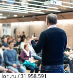 Sturtup expert giving talk at business event workshop. Стоковое фото, фотограф Matej Kastelic / Фотобанк Лори