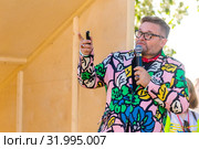 Russia, Samara, June 2019. Portrait of fashion historian Alexander Vasilyev at a lecture. Bank of the Volga. Festival "Volga Fest" Редакционное фото, фотограф Акиньшин Владимир / Фотобанк Лори