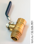 A Ball valve on a light background. Стоковое фото, фотограф Володина Ольга / Фотобанк Лори