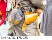 Vintage leather holster and other ammunition on the belt. Стоковое фото, фотограф FotograFF / Фотобанк Лори