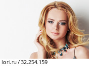 Woman with blonde curly hair and necklace. Стоковое фото, фотограф Иван Михайлов / Фотобанк Лори