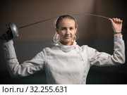 A portrait of a young woman fencer bending a singlestick. Стоковое фото, фотограф Константин Шишкин / Фотобанк Лори