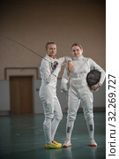 A portrait of two young women fencers looking at the camera. Стоковое фото, фотограф Константин Шишкин / Фотобанк Лори