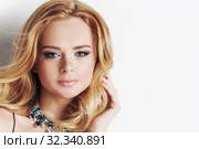 Woman with blonde curly hair and necklace. Стоковое фото, фотограф Иван Михайлов / Фотобанк Лори