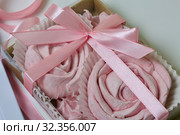 Aerial pink cherry marshmallows. Different shapes and sizes. Sprinkled with dextrose. Garnished with Chocolate. Стоковое фото, фотограф Vadzim Yakubovich / Фотобанк Лори