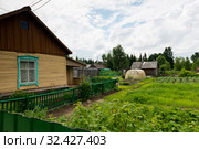 Россия, Сибирь, Ханты-Мансийский АО, Нефтеюганский район, село Лемпино, огород, теплица (2018 год). Стоковое фото, фотограф Александр Циликин / Фотобанк Лори