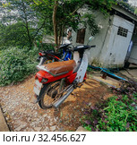 Motorbike, scooter, traditional two wheels transport in Asia. Стоковое фото, фотограф Aleksejs Bergmanis / Фотобанк Лори