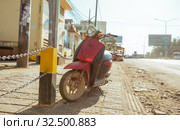 Motorbike, scooter, traditional two wheels transport in Asia. Стоковое фото, фотограф Aleksejs Bergmanis / Фотобанк Лори