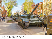 Russia, Samara, May 2017: a new military modified main battle tank T-72B3M in green camouflage on a city street prepared for the parade on Victory Day on a spring sunny day. Редакционное фото, фотограф Акиньшин Владимир / Фотобанк Лори