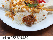 Алу Пядж Чаначур с рисом и пикули из манго. Стоковое фото, фотограф Марина Володько / Фотобанк Лори