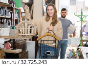 female satisfied with purchases in furnishings store. Стоковое фото, фотограф Яков Филимонов / Фотобанк Лори