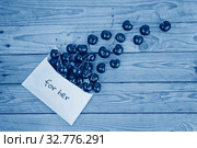 Ripe cherries dropped from white envelope. Стоковое фото, фотограф Kira_Yan / Фотобанк Лори