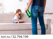 Drunk father in domestic child abuse and violence concept. Стоковое фото, фотограф Elnur / Фотобанк Лори