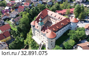Aerial view of impressive medieval Gewerkenegg Castle in small Slovenian township of Idrija on sunny autumn day (2019 год). Стоковое видео, видеограф Яков Филимонов / Фотобанк Лори