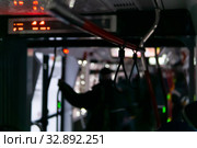 Blurred background with dark interior of public transport. Стоковое фото, фотограф Евгений Харитонов / Фотобанк Лори