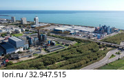 Aerial panoramic view of chemical process plant on Mediterranean coast near Mataro, Catalonia, Spain (2019 год). Стоковое видео, видеограф Яков Филимонов / Фотобанк Лори