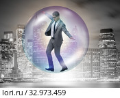Businessman flying inside the bubble. Стоковое фото, фотограф Elnur / Фотобанк Лори