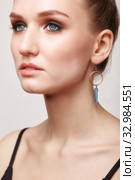 Beautiful woman with galvanic earring in form blue crystal. Стоковое фото, фотограф Сергей Пристяжнюк (Serg Zastavkin) / Фотобанк Лори