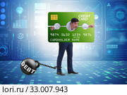 Businessman in credit card burden concept in pillory. Стоковое фото, фотограф Elnur / Фотобанк Лори