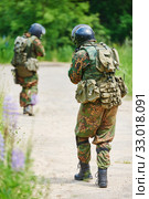 Military soldier armed with rifle gun. Стоковое фото, фотограф Дмитрий Калиновский / Фотобанк Лори