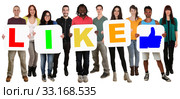 group of young people people holding multicultural word like. Стоковое фото, фотограф Markus Mainka / PantherMedia / Фотобанк Лори