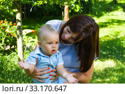 charming caucasian baby boy with mother. Стоковое фото, фотограф Oleksandr Chub / PantherMedia / Фотобанк Лори
