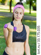 Fitness Slim Woman Training With Dumbbells. Стоковое фото, фотограф Mitar gavric / PantherMedia / Фотобанк Лори