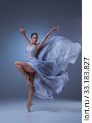The beautiful ballerina dancing in blue long dress. Стоковое фото, фотограф Volodymyr Melnyk / PantherMedia / Фотобанк Лори