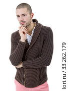 pensive young casual man portrait,  isolated on white. Стоковое фото, фотограф Rui Vale de Sousa / Smarterpix / Фотобанк Лори