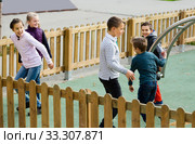 Positive children playing romp game Touch-last. Стоковое фото, фотограф Яков Филимонов / Фотобанк Лори