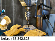 Work on a drilling machine with a countersink close-up. Стоковое фото, фотограф Евгений Харитонов / Фотобанк Лори