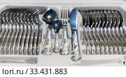 Set of cutlery - melchior spoons, forks and knifes. Стоковое фото, фотограф Евгений Ткачёв / Фотобанк Лори