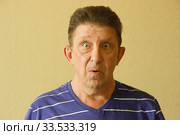 Постановочный  мужской портрет. Стоковое фото, фотограф Евгений Будюкин / Фотобанк Лори