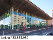 Exterior of the central bus terminal with ticket offices. Glass building. The Titsa company is a operator of public bus service in Tenerife (2016 год). Редакционное фото, фотограф Кекяляйнен Андрей / Фотобанк Лори