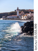 The Basilica of the Royal Marian Shrine of Our Lady of Candelaria with shoreline. The Candelaria town is a popular touristic place for visiting. Tenerife, Canary, Spain (2016 год). Стоковое фото, фотограф Кекяляйнен Андрей / Фотобанк Лори