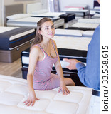 Man and woman choosing futon. Стоковое фото, фотограф Яков Филимонов / Фотобанк Лори