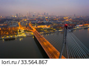 Swietokrzyski bridge over the Vistula river at night. Warsaw, Poland (2020 год). Стоковое фото, фотограф Яков Филимонов / Фотобанк Лори