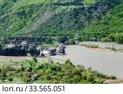 Dam of the old hydroelectric power plant on the river Kura downstream from Mtskheta in Georgia. Стоковое фото, фотограф Николай Коржов / Фотобанк Лори