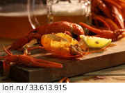 Crayfish with beer on a wooden table. Стоковое фото, фотограф Марина Володько / Фотобанк Лори