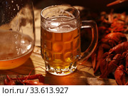 Crayfish with beer on a wooden table. Стоковое фото, фотограф Марина Володько / Фотобанк Лори