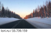 Traffic is on Federal road R21, the Kola highway at winter. Карелия. Стоковое видео, видеограф Кекяляйнен Андрей / Фотобанк Лори