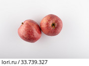 Ripe red apple on a white background. Стоковое фото, фотограф Evgeny Miller / Фотобанк Лори
