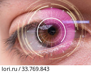 Concept of sensor implanted into human eye. Стоковое фото, фотограф Elnur / Фотобанк Лори