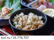 Fried rice with vegetables on a bowl, in a japanese diner. Clos. Стоковое фото, фотограф Gagara / Фотобанк Лори