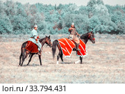 Russia, Samara, August, 2018: Participants of the equestrian program "Competitions of medieval horsemen". Military history festival "Military case". Редакционное фото, фотограф Акиньшин Владимир / Фотобанк Лори