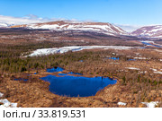 View from the helicopter to the valley of the mountain river. Northern landscape. The mountains are covered with glaciers. Стоковое фото, фотограф Евгений Ткачёв / Фотобанк Лори