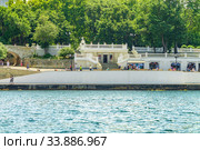 View from the sea to the Kornilov embankment of the Sevastopol Bay   Вид с моря на набережную Корнилова Севастопольской бухты (2018 год). Редакционное фото, фотограф Владимир Ушаров / Фотобанк Лори
