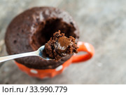 Chocolate pie in a cup filled with a liquid. Стоковое фото, фотограф Tetiana Chugunova / Фотобанк Лори