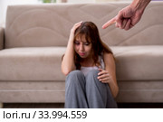 Young couple in domestic violence concept. Стоковое фото, фотограф Elnur / Фотобанк Лори