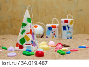Handmade candles in the shape of a pyramid, cube, cylinder and sphere. Стоковое фото, фотограф Nataliia Zhekova / Фотобанк Лори